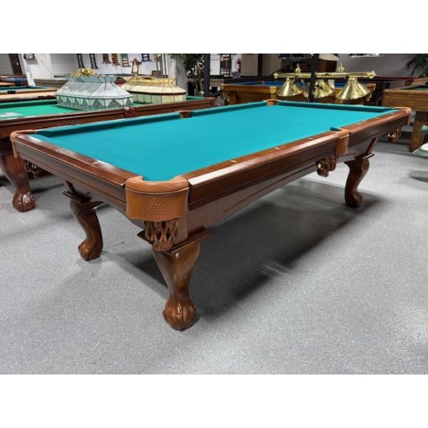 Table de billard usagée Legacy Billiards 8 pieds fini Noyer avec tapis Beige Chameau Code : TABLE579LEG8P
Fabriquée en bois massif, ardoise naturelle d'un pouce et un tapis de billard tapis de billard Bleu Turquoise de marque Championship Invitational av
